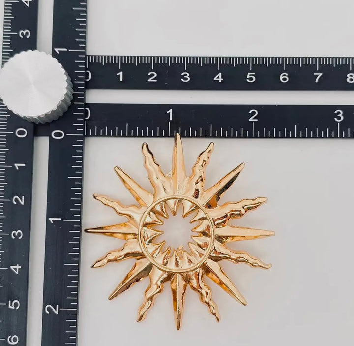 Vintage Hollow Sun Brooch