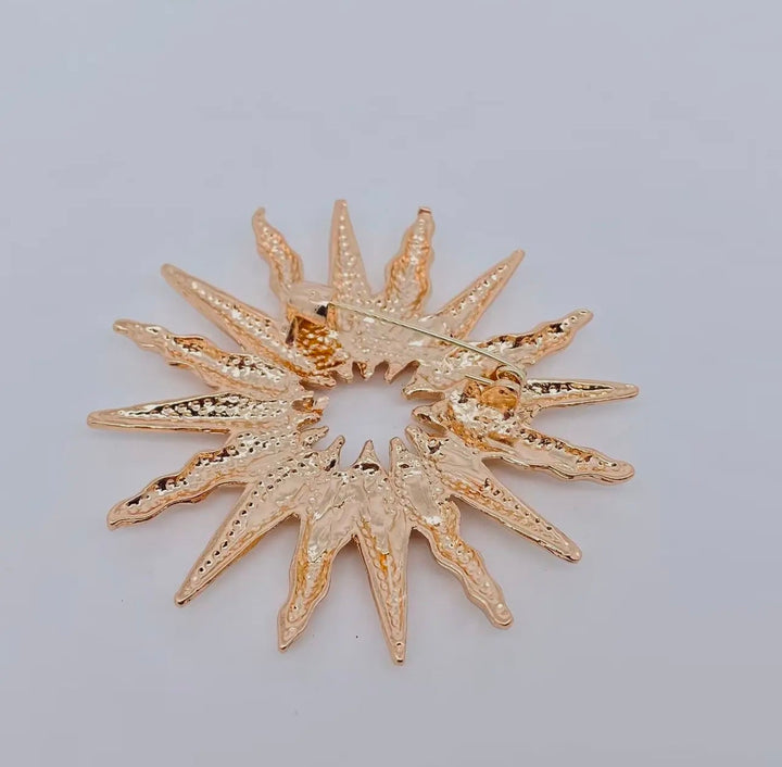 Vintage Hollow Sun Brooch